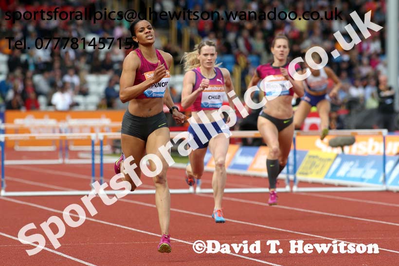 Kaliese Spencer on her way to winning the womens 400 metres hurdles at the Sainsbury's Birmingham Grand Prix. Photos: David T. Hewitson/Sports for All Pics